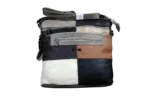 Cowhide Leather Crossbody Bag SKU 3383 detail view showing compact body and strap connection points