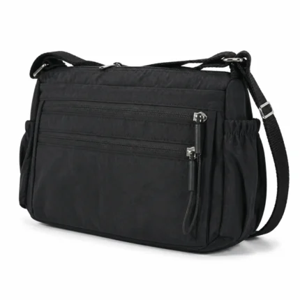 Polyester utility crossbody bag OEM SKU 5032 with black fabric body, front zipper sections, side pockets, and strap points