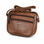 Brown sheepskin shoulder bag OEM SKU 642B with compact rounded body, two front zipper pockets, and shoulder strap