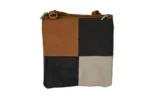 Cowhide Leather Compact Crossbody Bag SKU 6673 detail view showing compact body and strap connection points