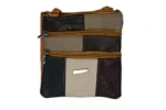 Cowhide Leather Compact Crossbody Bag SKU 6673 front view showing compact body and strap connection points