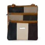 Cowhide multi-zip crossbody pouch OEM SKU 6673 with small square body, front zipper sections, panel seams, and flat side depth