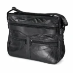 Black patchwork multi-pocket tote OEM SKU 6774 with curved front panel, front zipper pockets, rear zipper pocket, and shoulder strap