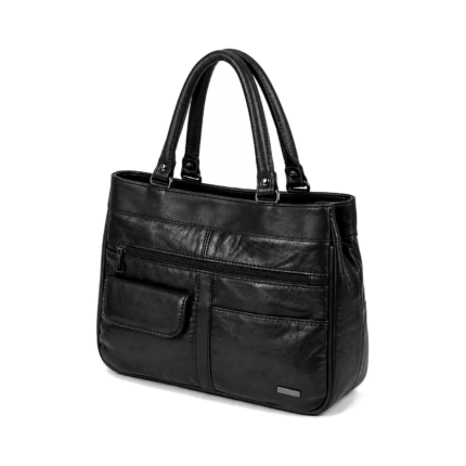 Black tote with twin ring-mounted handles, a front zip and a small flap detail — Sheepskin leather, SKU 3591